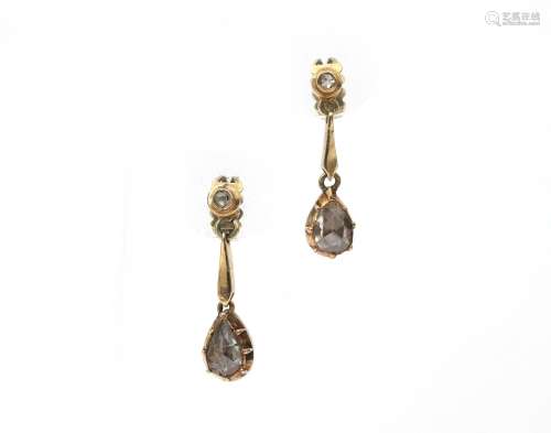 A pair of 14 karat gold rose cut diamond earrings. Featuring...