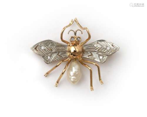 An 18 karat two tone fly brooch with pearl and diamonds. Fea...