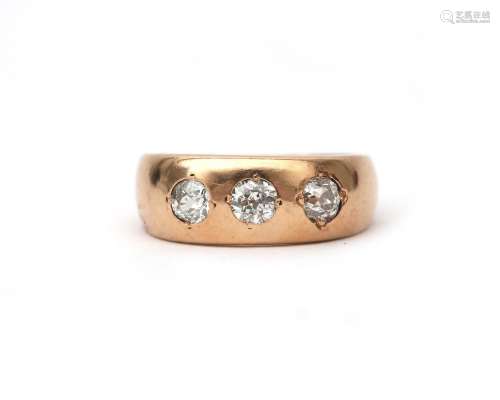 A 14 karat rose gold diamond `gypsy` ring. Featuring three o...