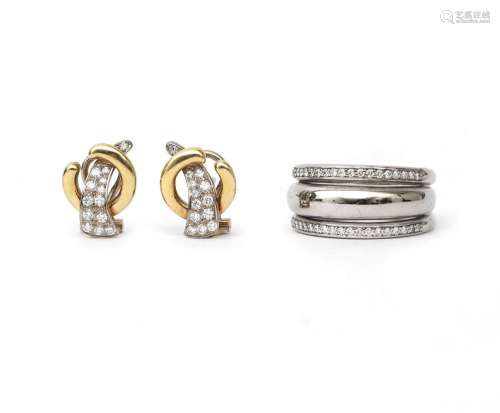 A 14 karat white gold diamond ring with a pair of 14 karat d...