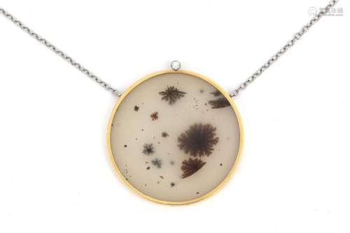 An 18 karat two tone gold necklace and pendant with dendriti...
