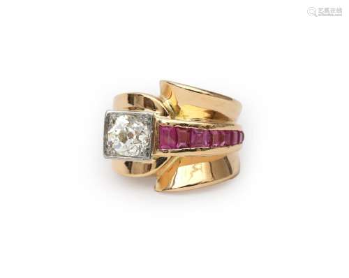 An 18 karat rose gold retro diamond and ruby ring. ca. 1950....