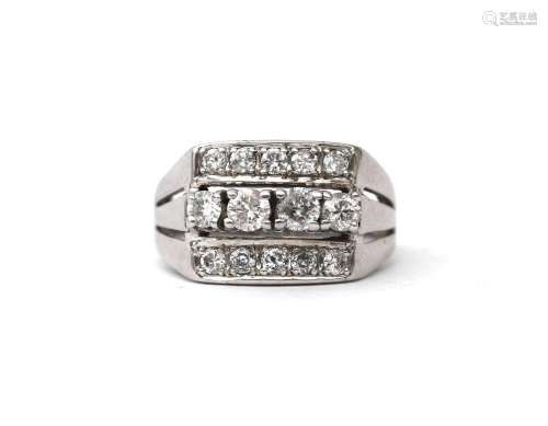 A 14 carat diamond white gold ring, ca. 1960. Featuring ten ...