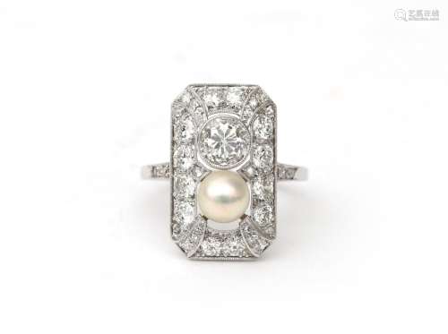 A platina 850 Art Deco diamond and pearl ring. Featuring an ...