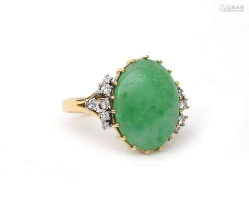 An 18 karat gold jadeite and diamond ring. Gross weight: 10 ...