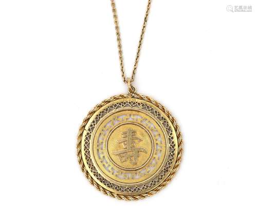 A necklace with a 14 karat gold Chinese pendant. A round pen...