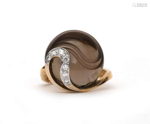 An 18 karat rose gold ring with smoky quartz and diamonds, b...