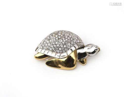 A 14 karat two tone gold diamond turtle brooch. Encrusted wi...