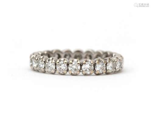 A 18 karat white gold diamond eternity ring. Featuring twent...