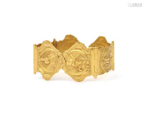 An 18 karat gold bracelet made from a book clasp. Composed o...
