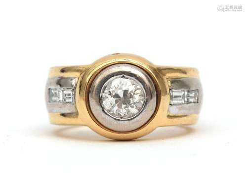 An 18 karat gold bi-colour ring with oldmine cut diamond, ca...