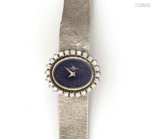 An 18 krt. white gold wristwatch by Baume & Mercier with...