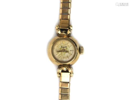 An 18 karat gold Piaget lady`s wristwatch. Gross weight: 19....