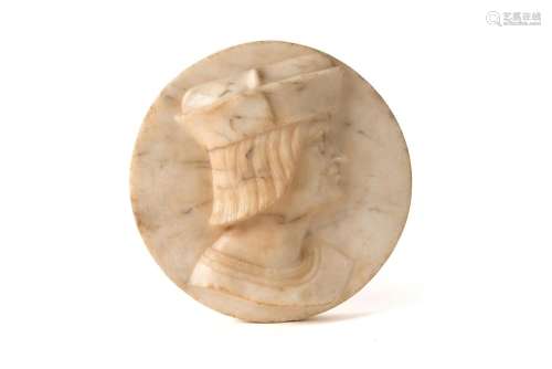 A round marble plaque with relief, depicting a man. Italy, p...
