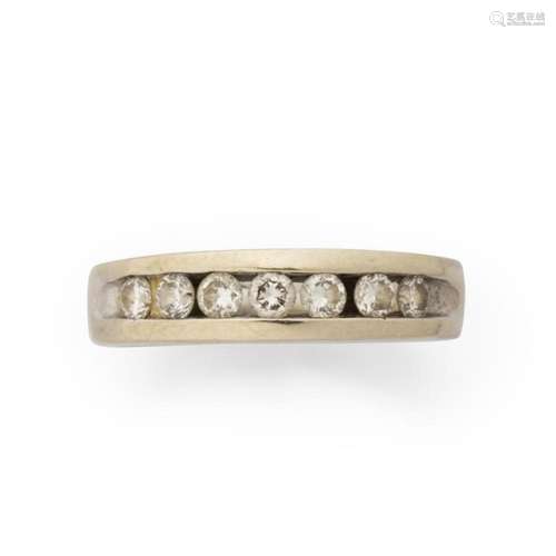 A diamond and fourteen karat white gold ring