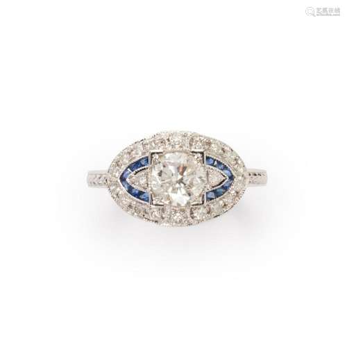 A diamond, sapphire and eighteen karat white gold ring