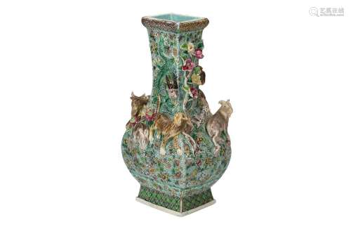 A polychrome porcelain vase, decorated in relief with the tw...