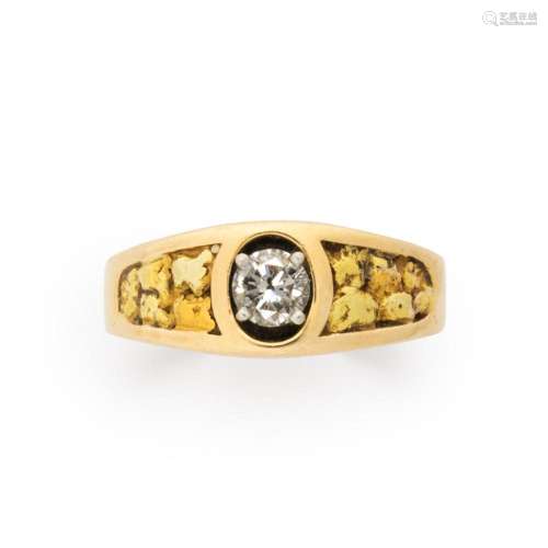A diamond and fourteen karat gold ring