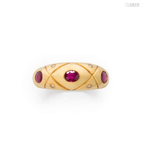 A diamond, ruby and eighteen karat gold ring
