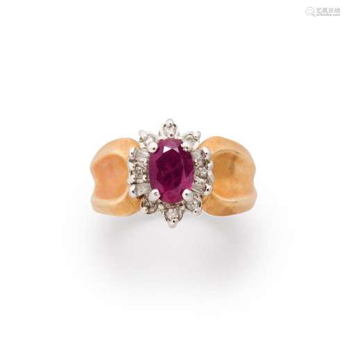 A ruby, diamond and fourteen karat gold ring