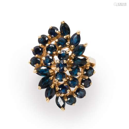 A sapphire and ten karat gold ring