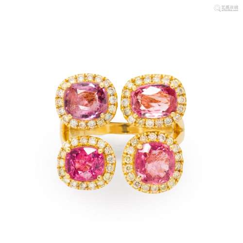 A purplish pink spinel, diamond and eighteen karat gold ring