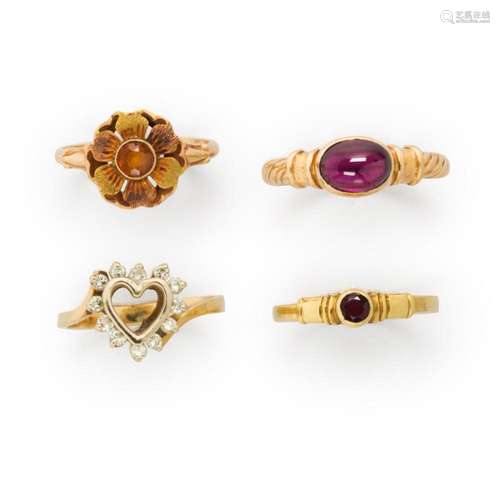 A group of gemstone and fourteen or eighteen karat gold ring...