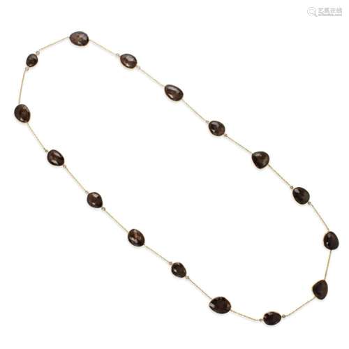 A brown sapphire, diamond and eighteen karat gold necklace