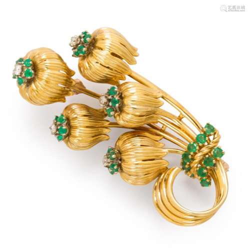 An emerald, diamond and fourteen karat gold brooch