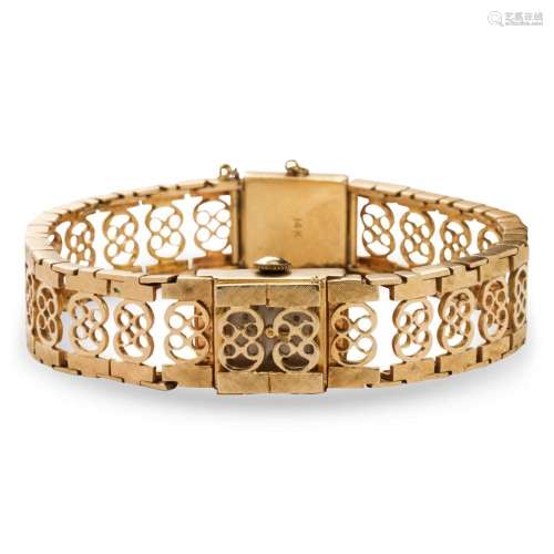 A fourteen karat gold watch bracelet
