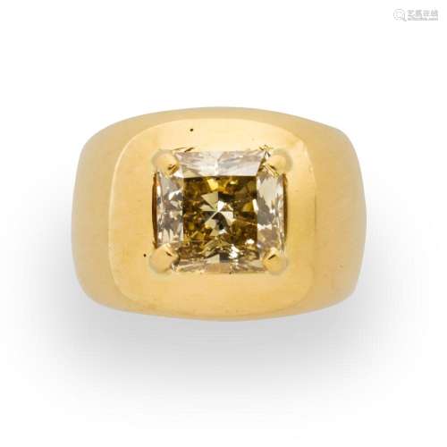 A colored diamond and eighteen karat gold ring