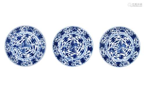 A set of three blue and white porcelain deep saucers, decora...