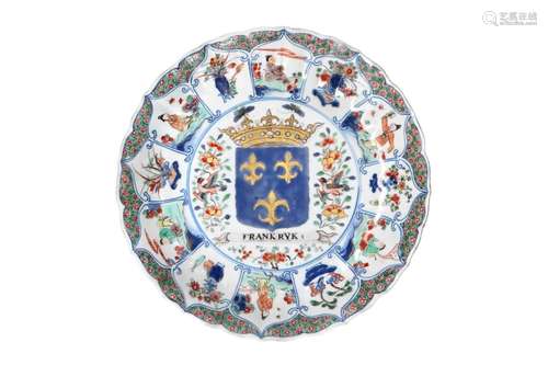 A polychrome porcelain lobed armorial dish with scalloped ri...