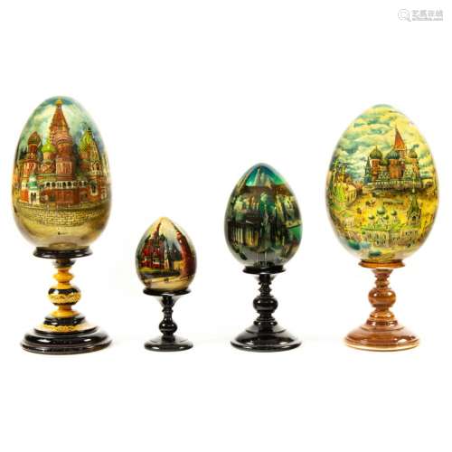 (Lot of 4) Russian lacquer eggs with aerial scenes of old Ru...