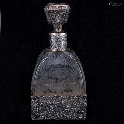 A Continental etched glass decanter fashioned in the Rococo ...