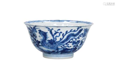 A blue and white porcelain lobed bowl with scalloped rim, de...