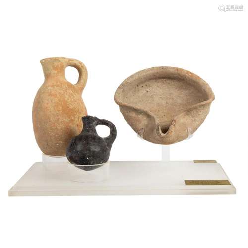 An Antiquity presentation set of three Iron Age ceramics