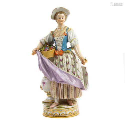 A Meissen figure of a lady with basket of flowers, late 19th...
