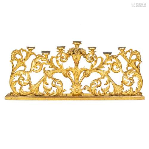 A Continental Baroque style giltwood seven-light altar cande...