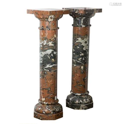 A pair of Classical style variegated marble pedestals