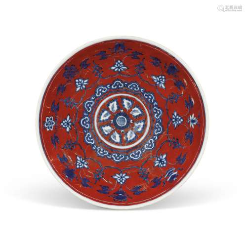 A RARE IRON-RED-GROUND BLUE AND WHITE SHALLOW BOWL