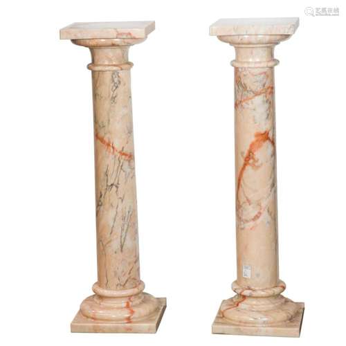 A pair of Classical style apricot marble pedestals