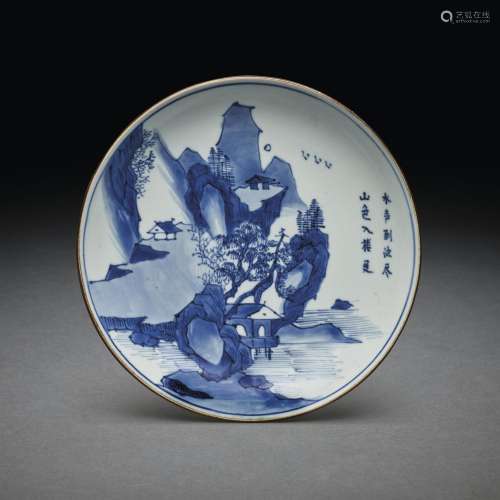 AN INSCRIBED BLUE AND WHITE 'LANDSCAPE' DISH