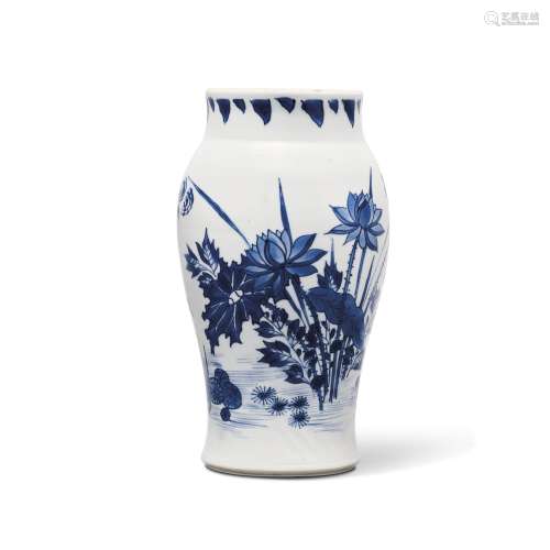 A SMALL BLUE AND WHITE BALUSTER VASE