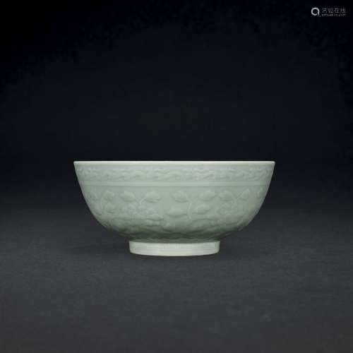 A LARGE MOULED AND INCISIED CELADON-GLAZED BOWL