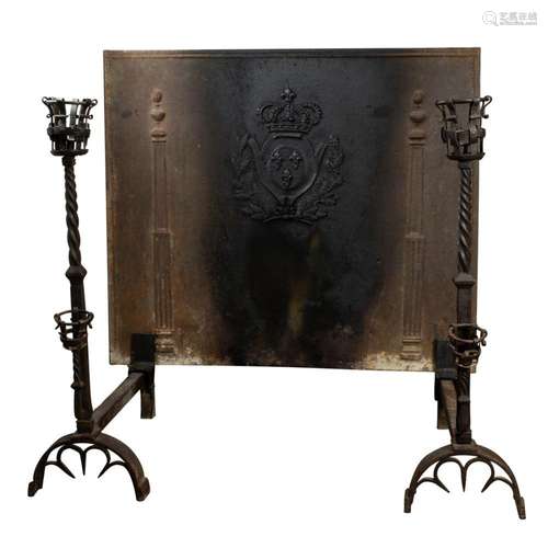 A massive pair of Continental wrought iron andirons and cast...