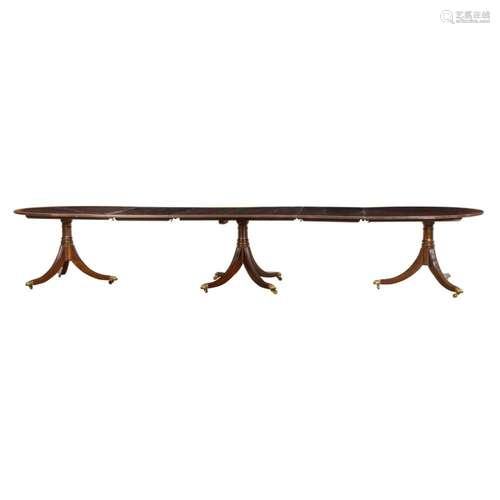 A Regency triple pedestal mahogany banquet table