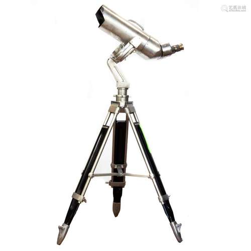 A large naval binocular on adjustable tripod stand, likely W...