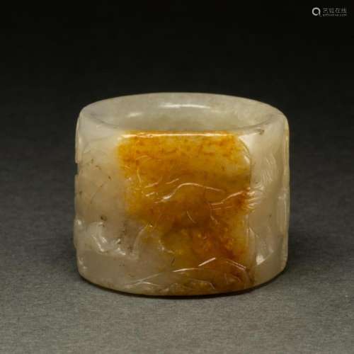 Chinese russet white and russet jade archer's ring