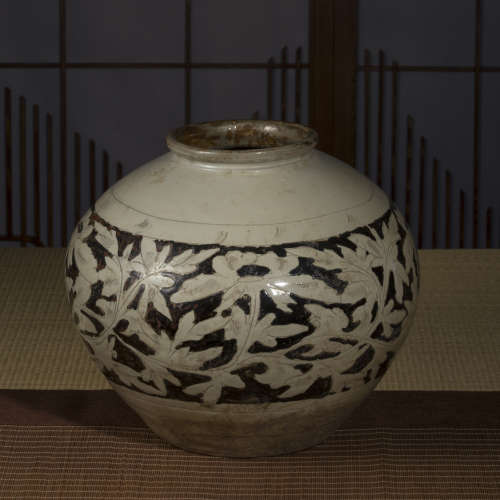 中國元時期  磁州窯剃刻花卉罐